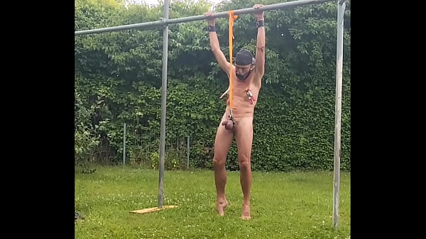 naked slave pig exposed outdoor tied up and swings at my testicles, clamps on nipple, BDSM CBT