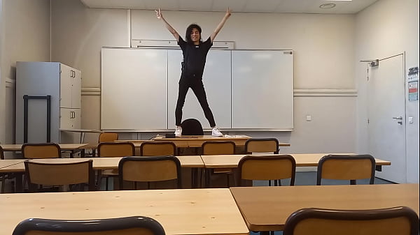 Twink student Jon Arteen goes to school to do a sexy dance before a striptease on the teacher’s desk in a classroom, he starts by showing off his red boxer underwear