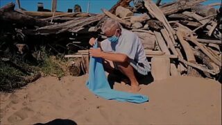 naked pathetic white slave in penis cage strip at the gay beach fucks himself with cucumber, CMNM